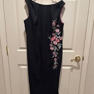 Long black dress with pink embroidered design
